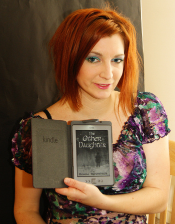 Rosen and her Kindle showing her new short story, The Other Daughter.